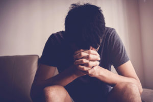 Man feeling upset.  Anxiety is a beast and when its out of control life can be unbearable. Anxiety treatment in Atlanta, East Cobb, or Marietta, can help. Learn more from an anxiety therapist and see how DBT therapy or emotionally focused therapy can help!