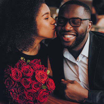 Couple sharing a sweet moment after attending marriage counseling in East Cobb